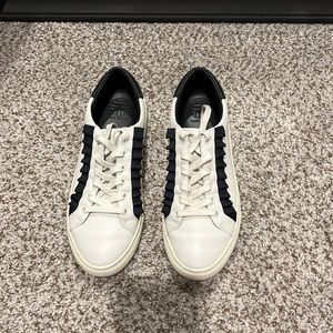 Tory Burch ruffled sneakers.